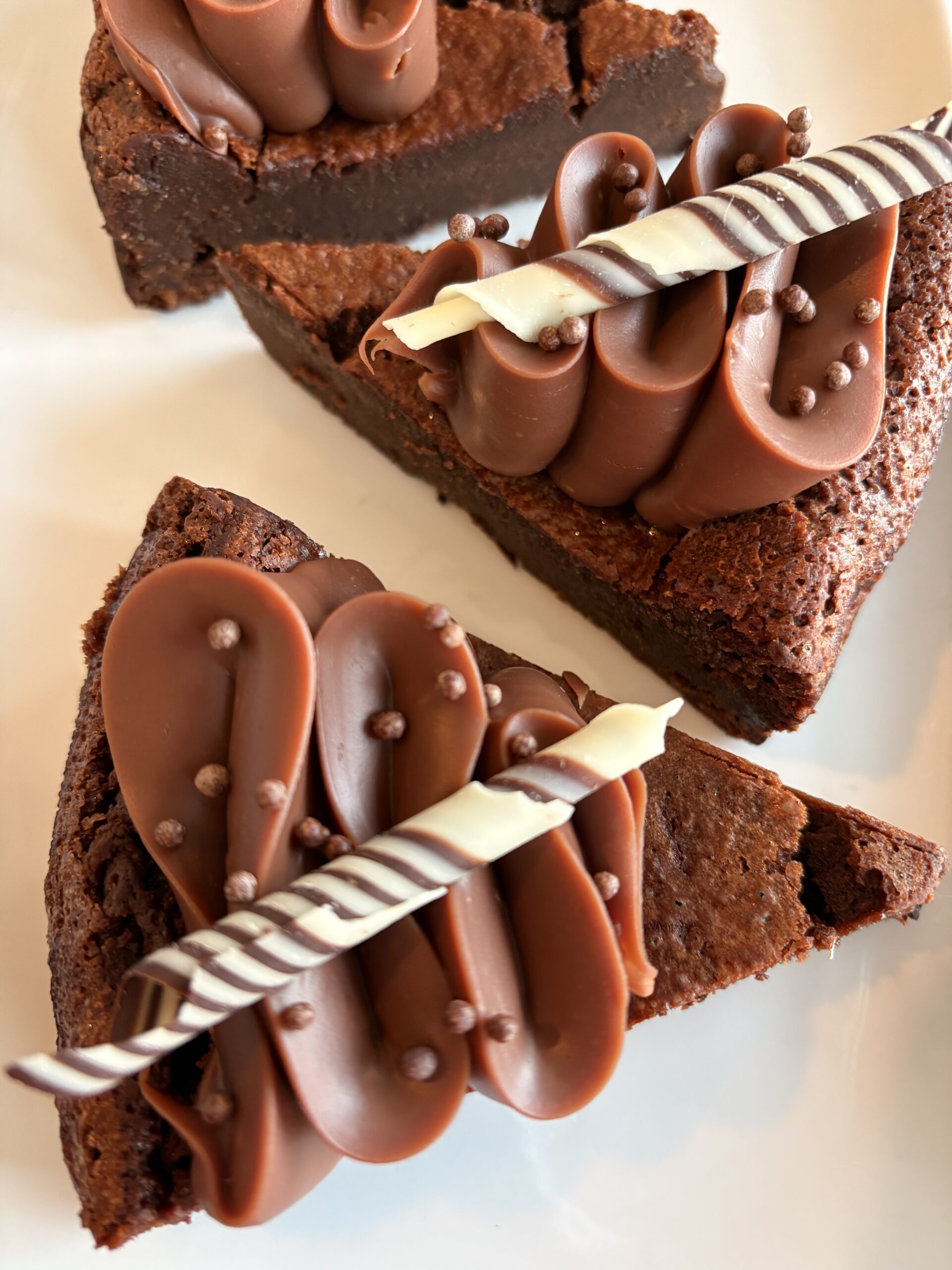 Chocolate Flourless Torte with Milk Chocolate Ganache- slice