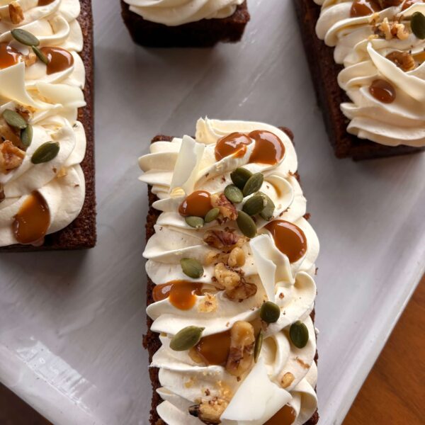 Pumpkin Walnut Loaf Cake with Maple Cream Cheese Frosting