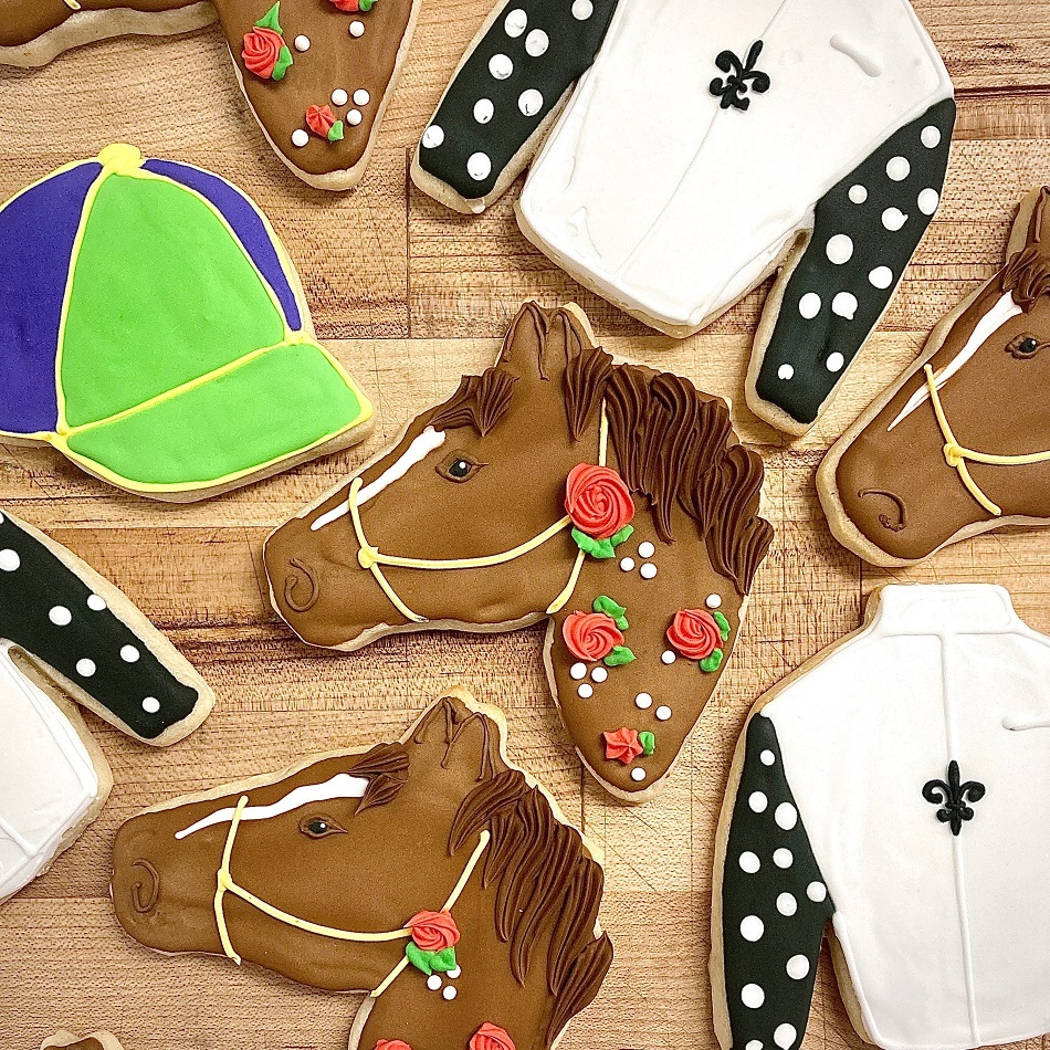horse cap and jockey coat shaped and decorated sugar cookies