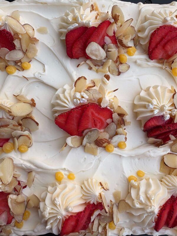 Hummingbird Sheet Cake with Cream Cheese Frosting and Toasted Pecans -  Slice