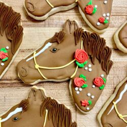 horse shaped derby sugar cookie with red roses decorations